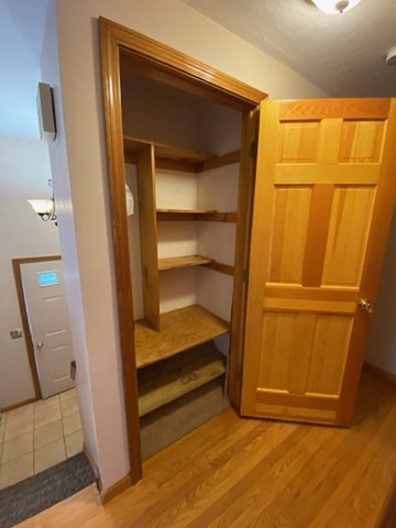 4 Hammerock Road Charlton, MA 01507 - Photo 36 of 39 a view of walk in closet with empty racks