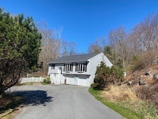 4 Hammerock Road Charlton, MA 01507 - Photo 7 of 39 a view of a house with a yard