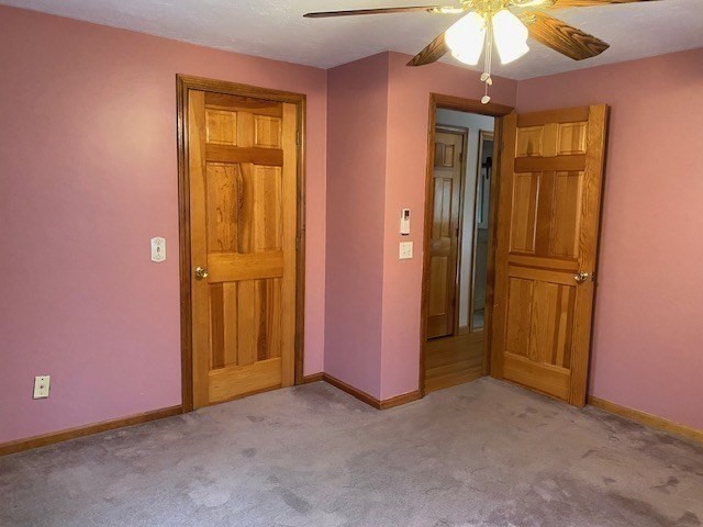 4 Hammerock Road Charlton, MA 01507 - Photo 9 of 39 an empty room with closet and a chandelier fan