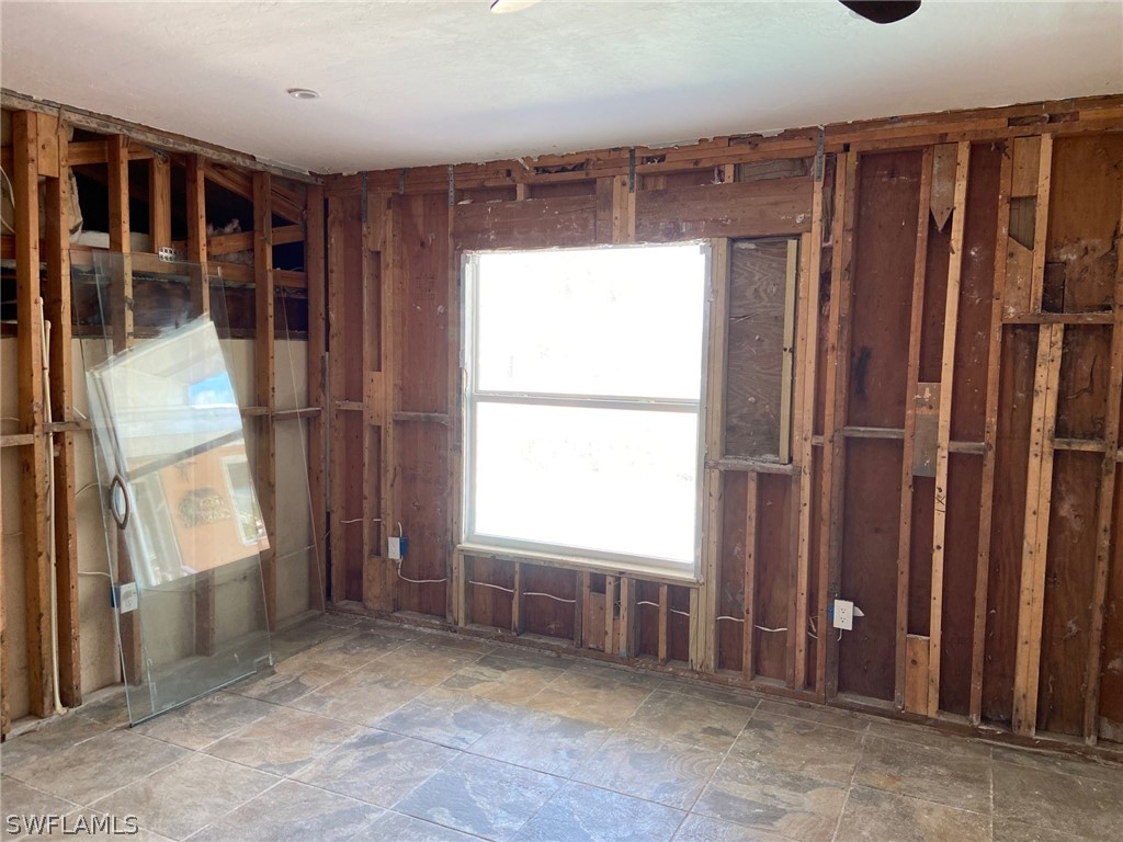 8065 Lagoon Road Fort Myers Beach, FL 33931 - Photo 11 of 28 a view of an empty room with a window
