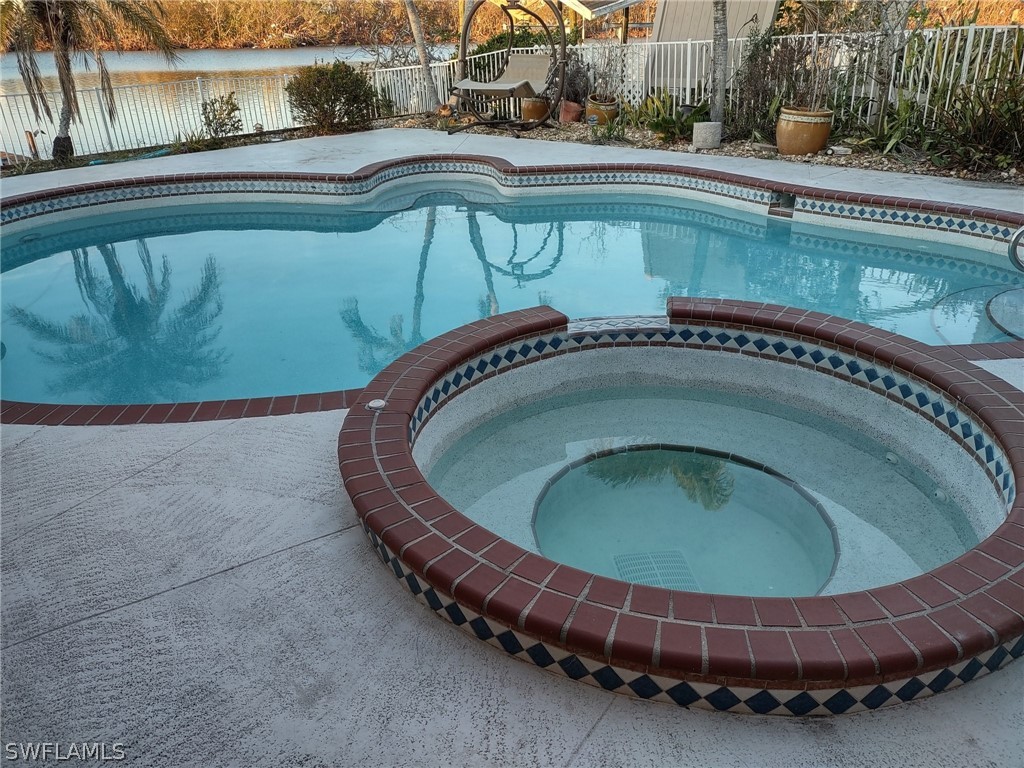 8065 Lagoon Road Fort Myers Beach, FL 33931 - Photo 12 of 28 a view of swimming pool from a balcony