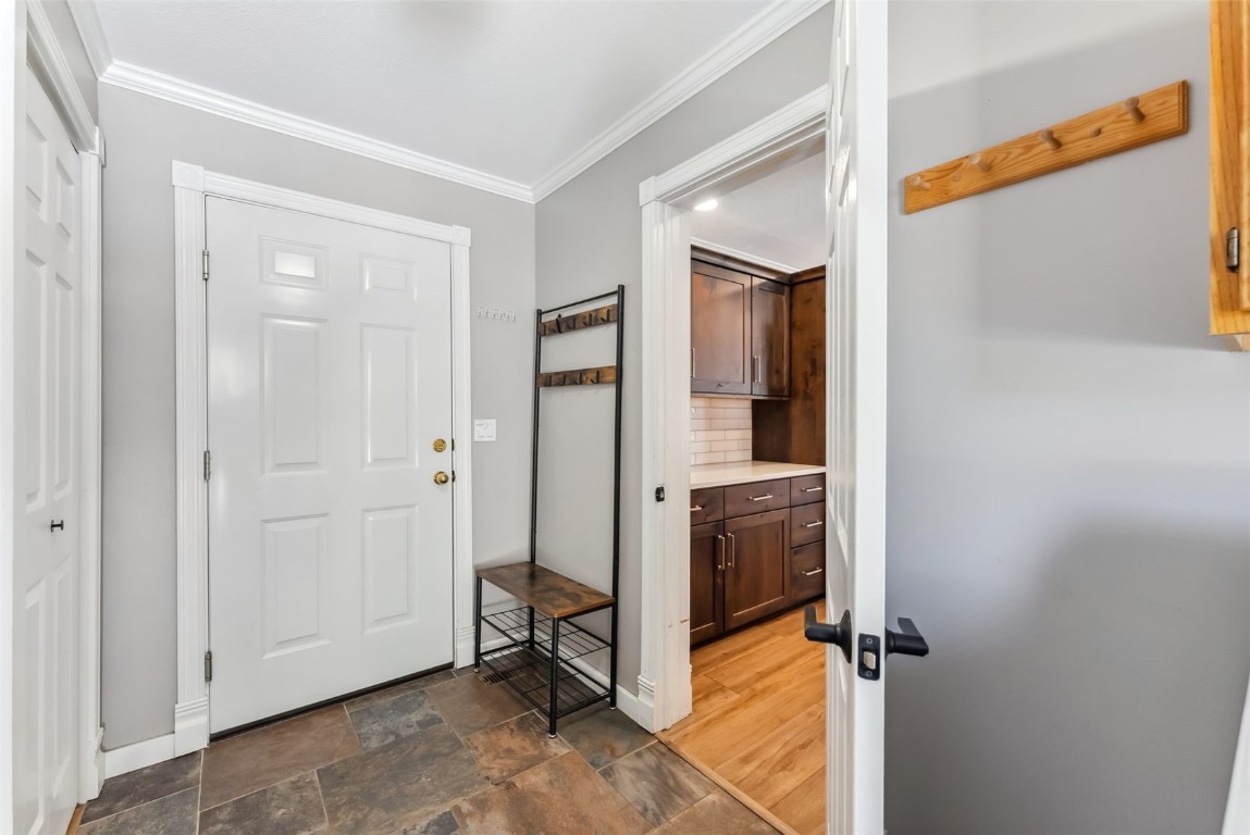 30 Grey Fox Lane Dillon, CO 80435 - Photo 36 of 50 Main level laundry/mud room off of the kitchen with outdoor backyard access and garage access