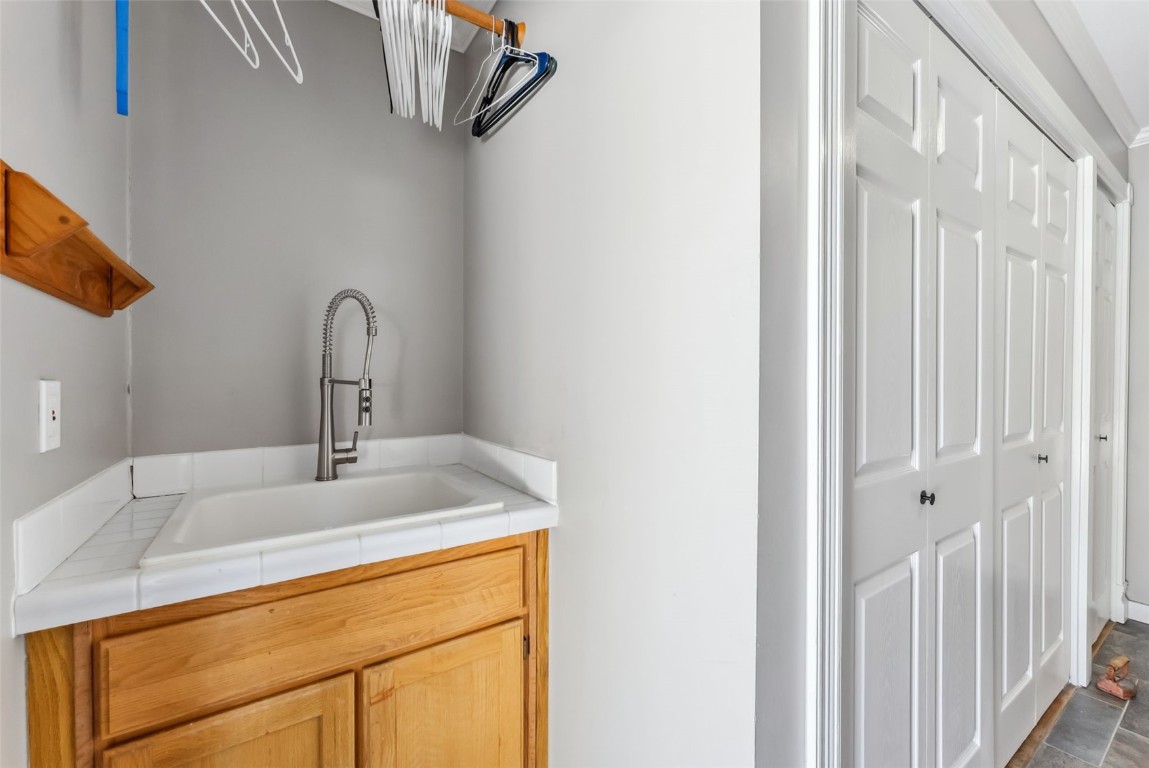 30 Grey Fox Lane Dillon, CO 80435 - Photo 38 of 50 Main level laundry/mud room off of the kitchen with outdoor backyard access and garage access