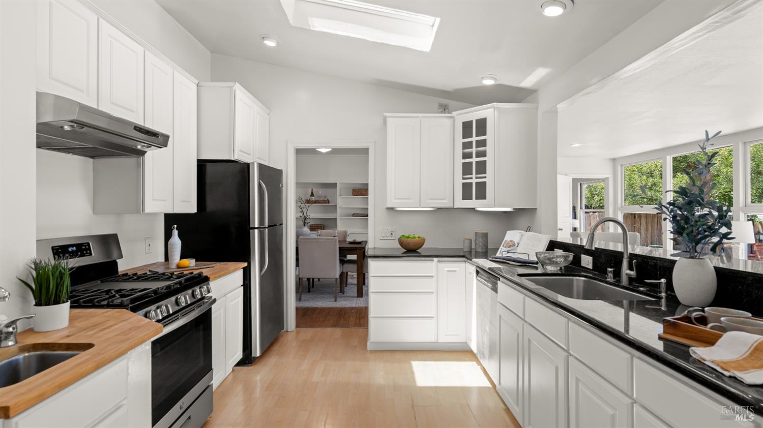 38 Bret Avenue San Rafael, CA 94901 - Photo 17 of 52 a kitchen with stainless steel appliances a stove refrigerator sink and cabinets