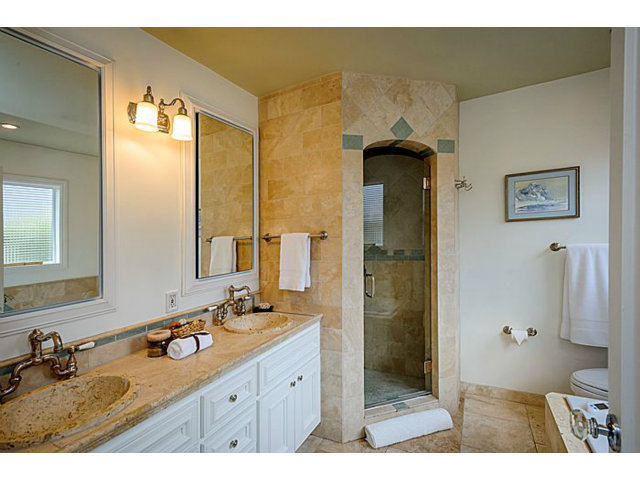 23 Channing Road Burlingame, CA 94010 - Photo 16 of 25 a bathroom with a granite countertop sink a mirror and a shower