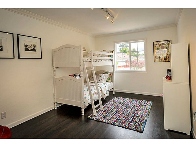 23 Channing Road Burlingame, CA 94010 - Photo 19 of 25 a bedroom with a bed and wooden floor