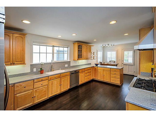 23 Channing Road Burlingame, CA 94010 - Photo 8 of 25 a large kitchen with stainless steel appliances lots of counter space sink and a window