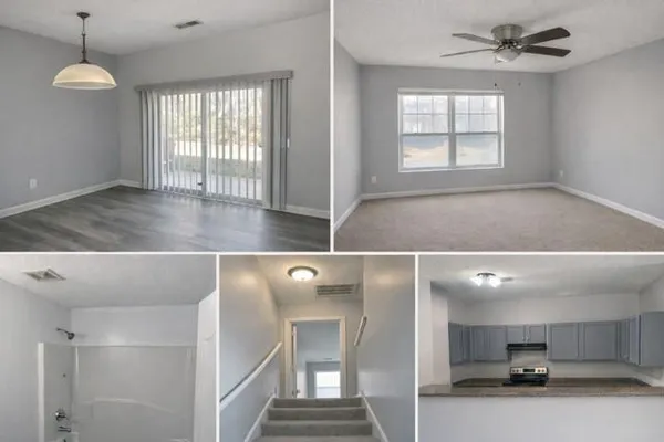 a view of a kitchen with a sink and a window