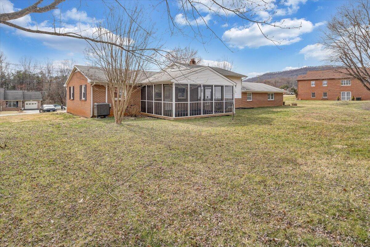 160 Bernard Road Rocky Mount, VA 24151 - Photo 46 of 56 a front view of a house with a garden