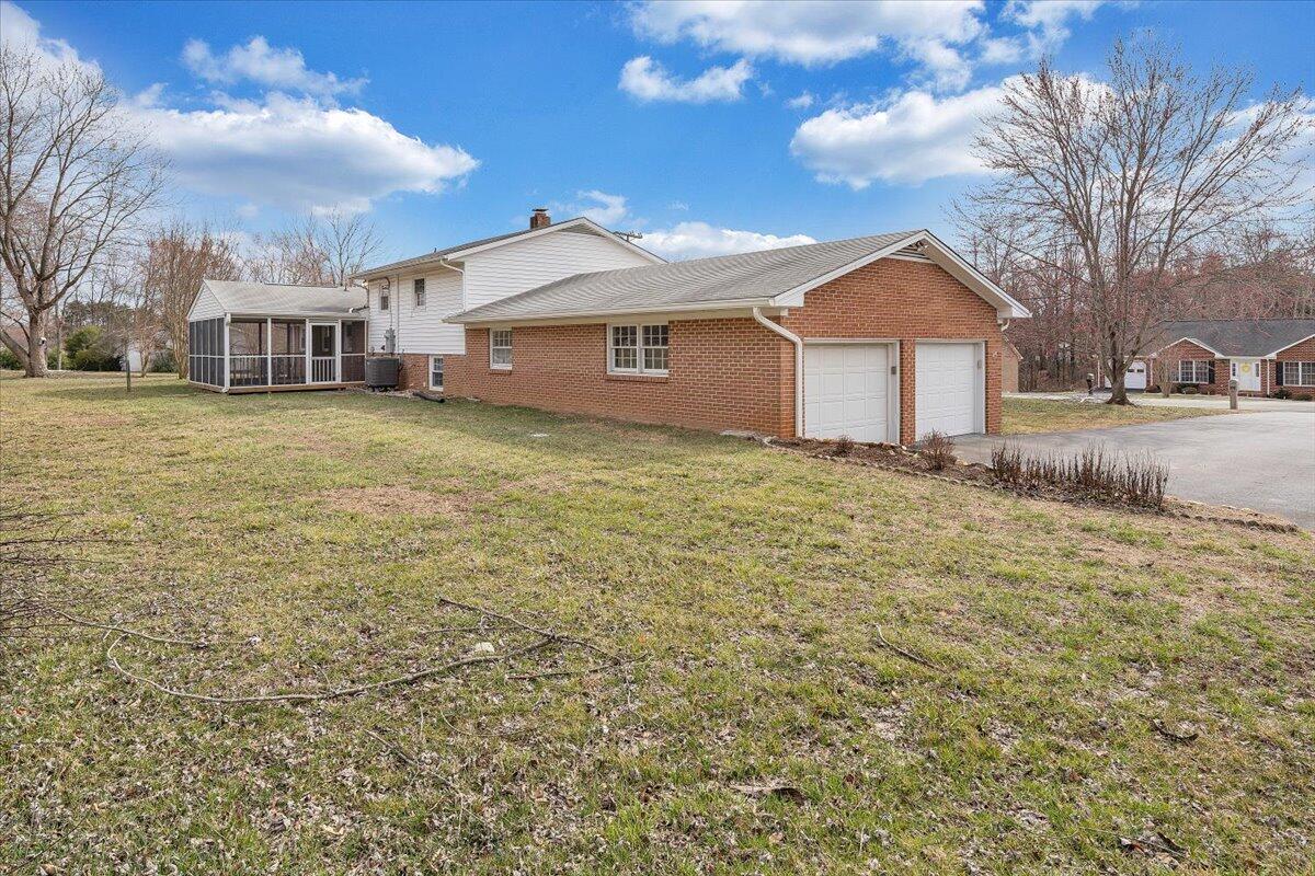 160 Bernard Road Rocky Mount, VA 24151 - Photo 48 of 56 a front view of a house with a yard