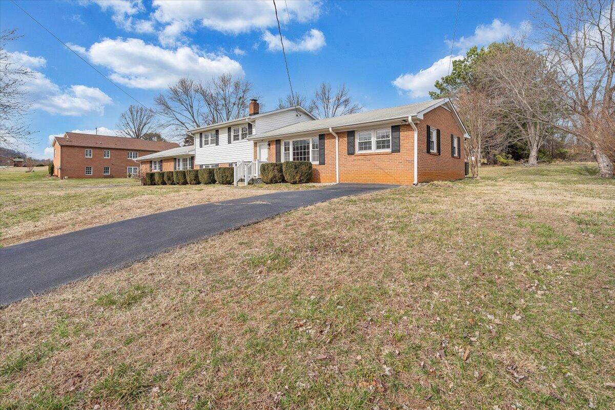 160 Bernard Road Rocky Mount, VA 24151 - Photo 55 of 56 a front view of a house with a yard