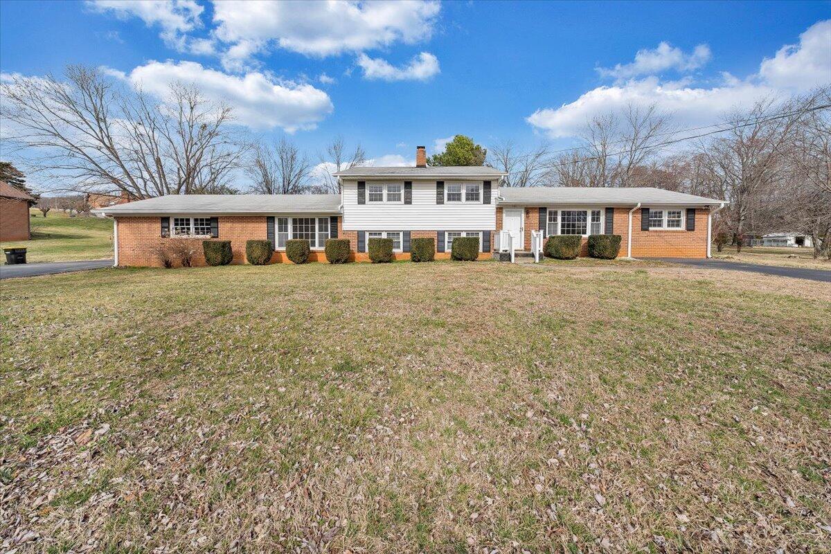 160 Bernard Road Rocky Mount, VA 24151 - Photo 56 of 56 a front view of a house with a garden