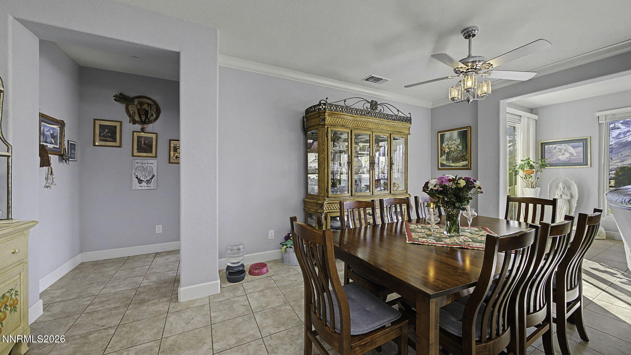9111 Kenton Trail Reno, NV 89523 - Photo 15 of 49 a view of a dining room with furniture and chandelier