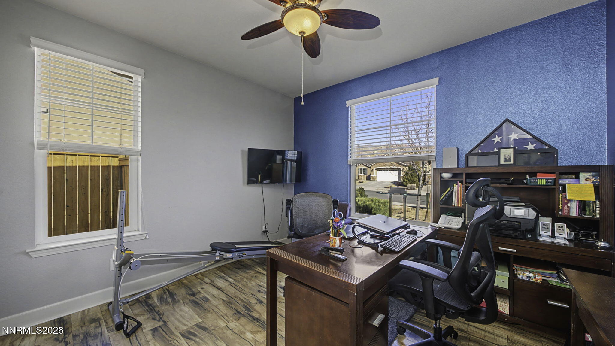 9111 Kenton Trail Reno, NV 89523 - Photo 21 of 49 a view of a workspace with furniture and a window