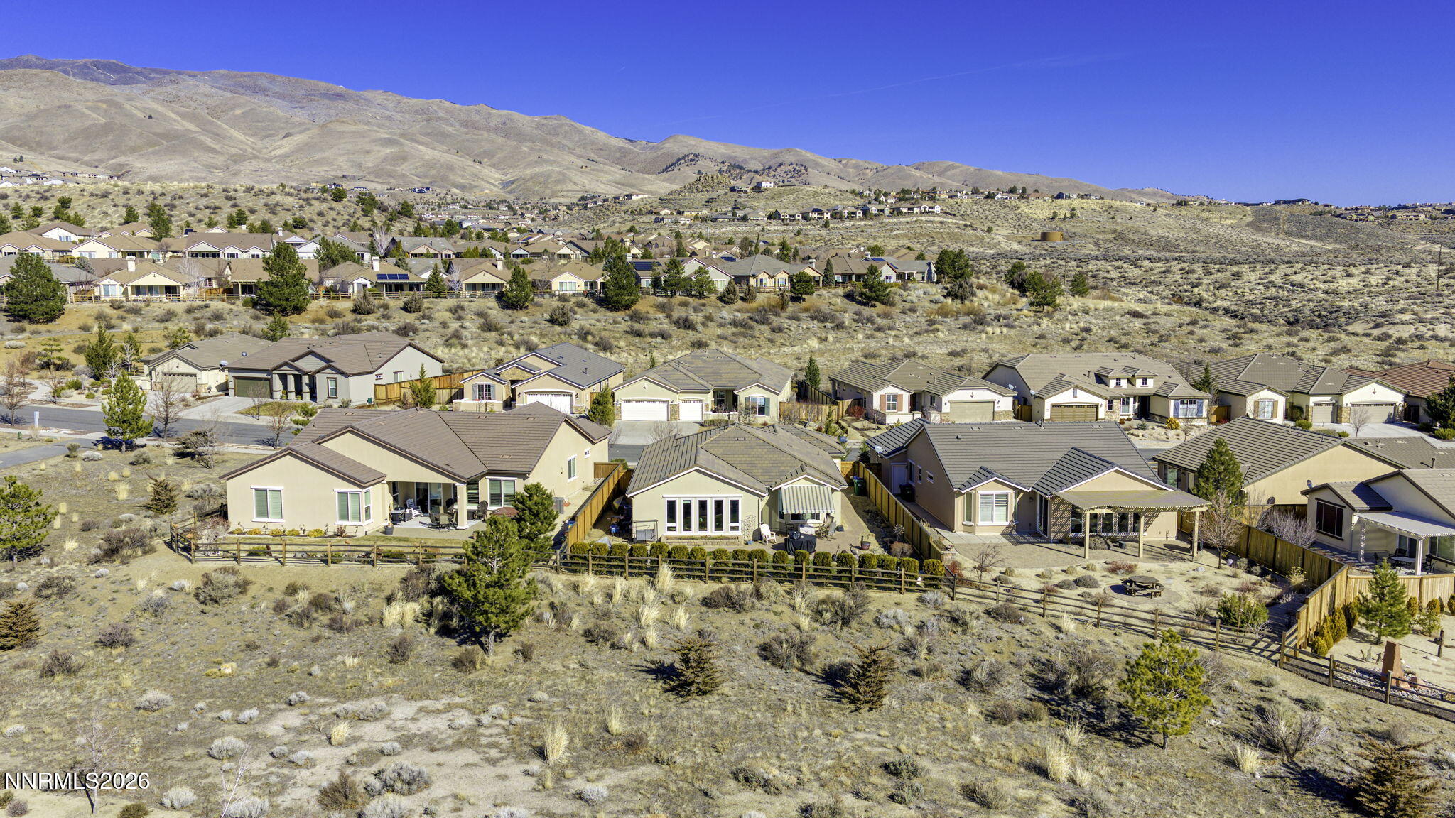 9111 Kenton Trail Reno, NV 89523 - Photo 45 of 49 a view of a house with a mountain in the background