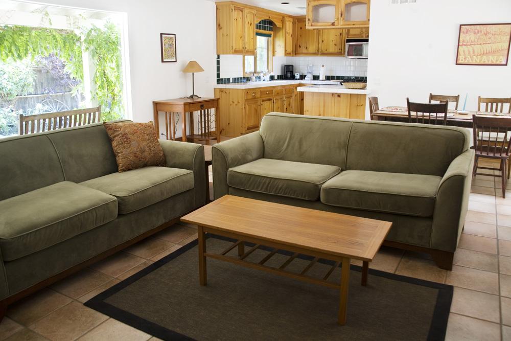 3959 Foothill Road Santa Barbara, CA 93110 - Photo 1 of 4 a living room with furniture wooden floor and a large window