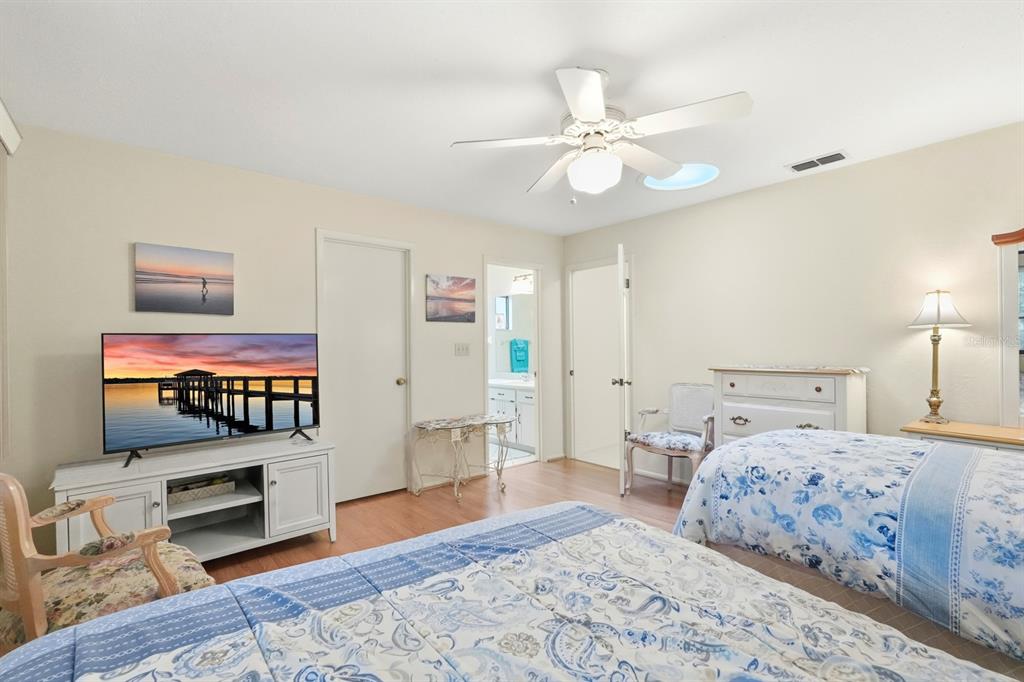 41 Crooked Pine Road Port Orange, FL 32128 - Photo 19 of 40 a bedroom with a bed and a flat screen tv