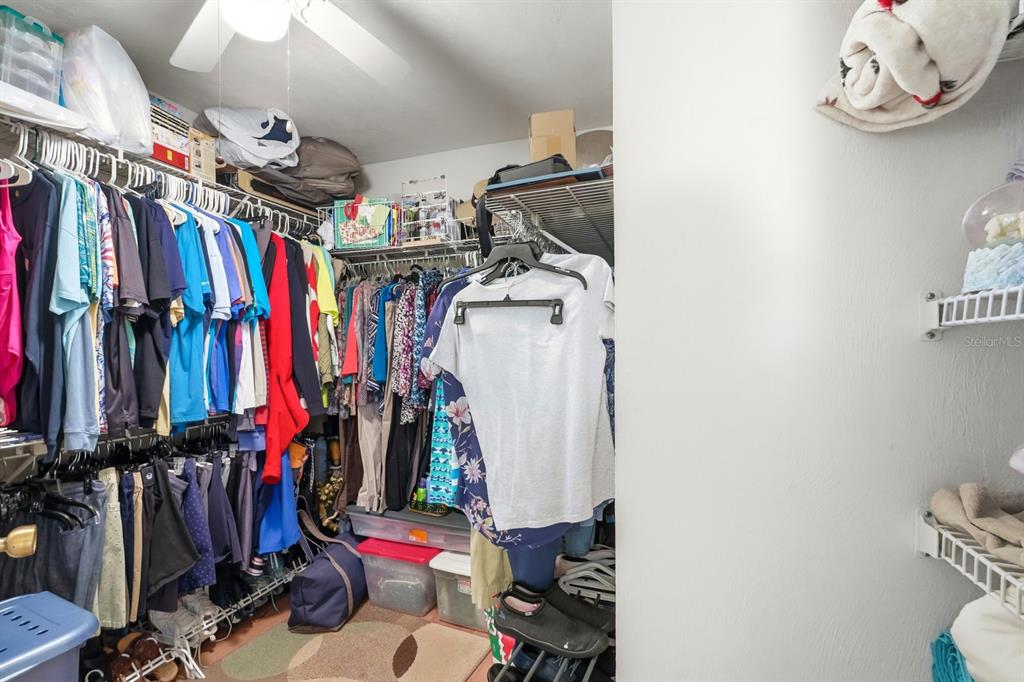 41 Crooked Pine Road Port Orange, FL 32128 - Photo 21 of 40 a view of walk in closet with clothes