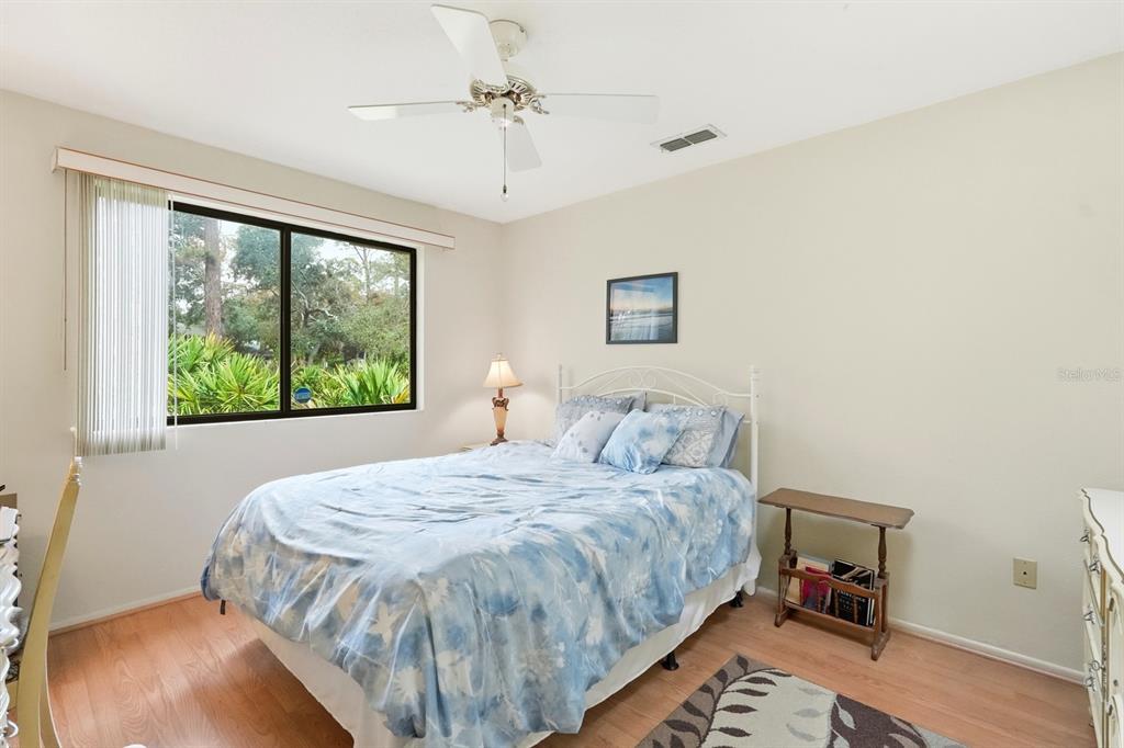41 Crooked Pine Road Port Orange, FL 32128 - Photo 22 of 40 a bedroom with a large bed and a window