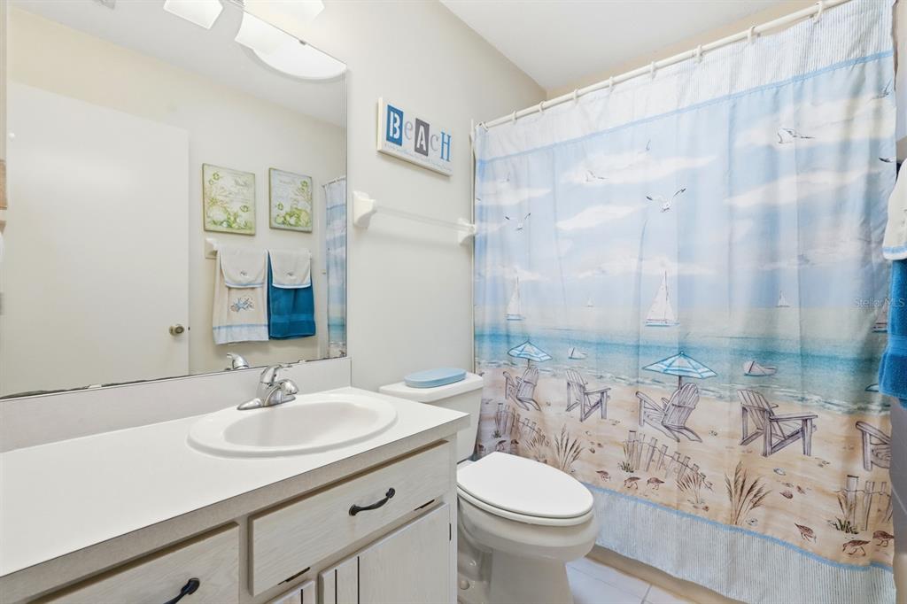 41 Crooked Pine Road Port Orange, FL 32128 - Photo 24 of 40 a bathroom with a sink toilet and shower
