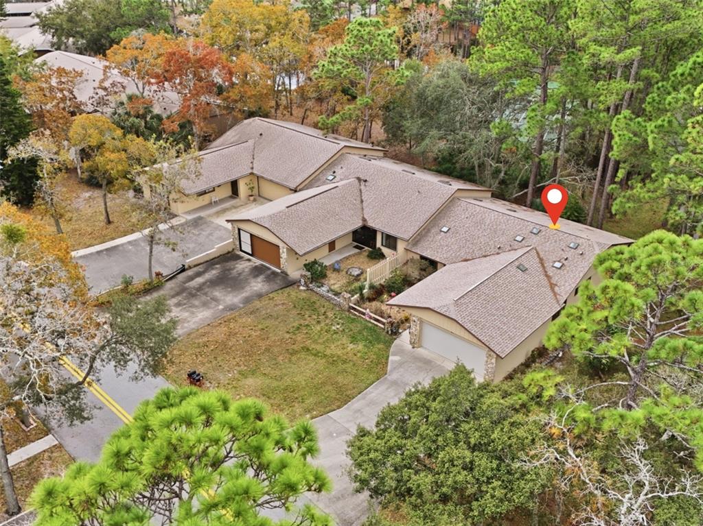 41 Crooked Pine Road Port Orange, FL 32128 - Photo 37 of 40 an aerial view of a house with a garden