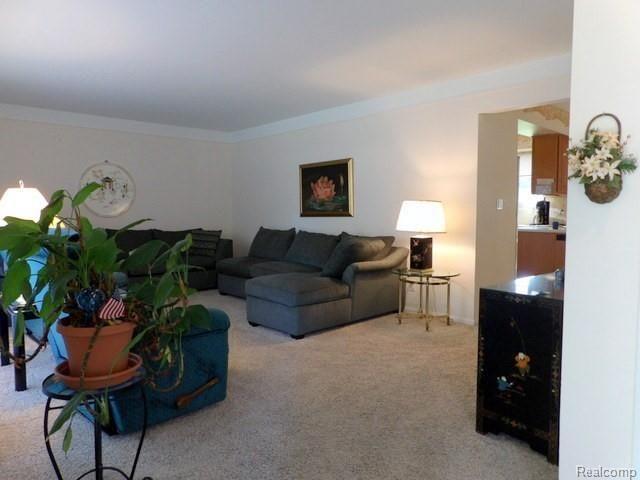 15325 Wick Road Allen Park, MI 48101 - Photo 13 of 45 THE LIVING ROOM FEATURES NEUTRAL DECOR!