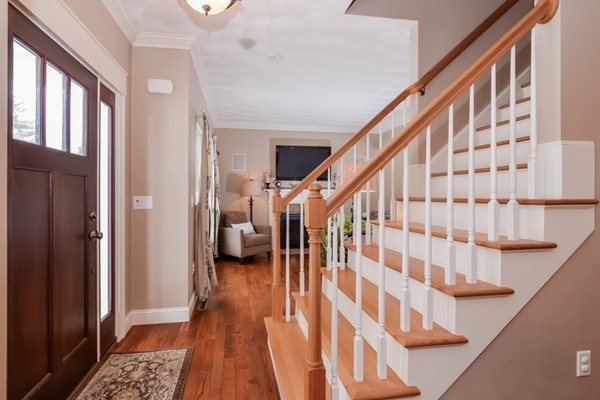 83 Scenic Way Exeter, RI 02822 - Photo 2 of 24 a view of entryway with wooden floor and stairs