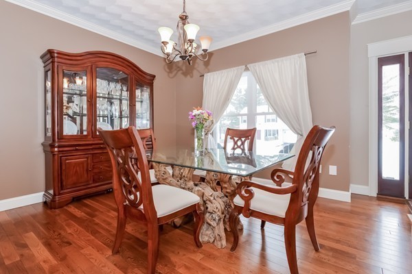 83 Scenic Way Exeter, RI 02822 - Photo 5 of 24 a view of a dining room with furniture window and wooden floor