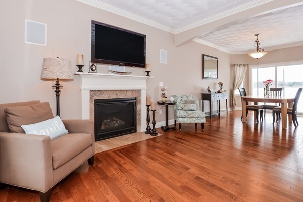 83 Scenic Way Exeter, RI 02822 - Photo 6 of 24 a living room with furniture fireplace and flat screen tv