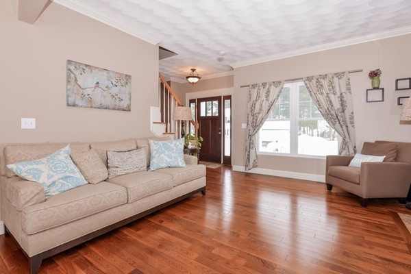 83 Scenic Way Exeter, RI 02822 - Photo 7 of 24 a living room with furniture and a large window