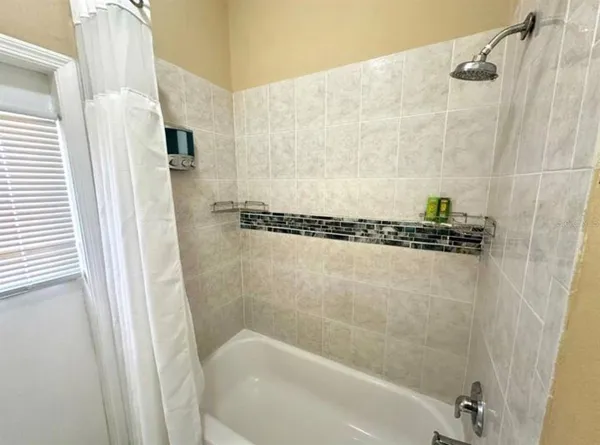 a bathroom with a bathtub