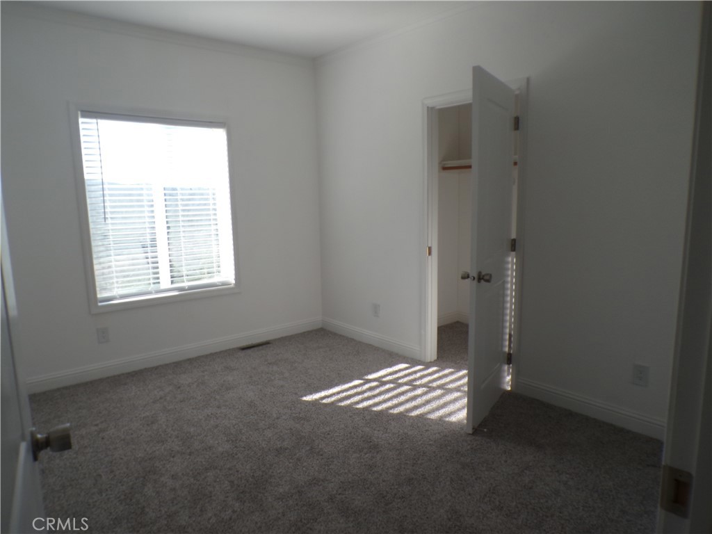 15305 Trinity Road Cobb, CA 95426 - Photo 11 of 12 a view of an empty room with a window