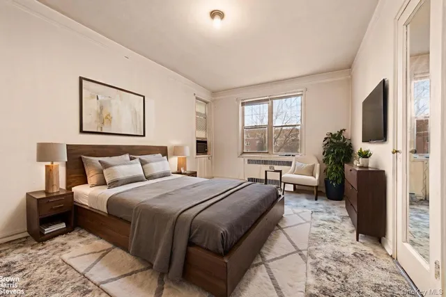 a bedroom with a bed and a couch