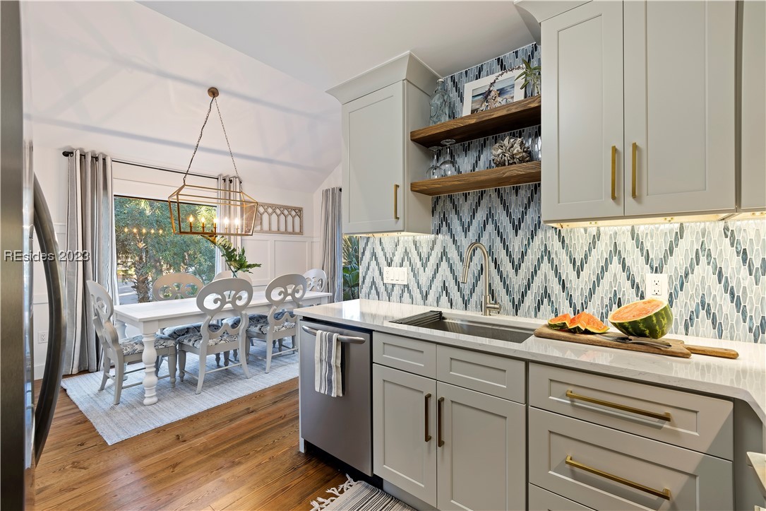 5 Compass Point Road, Unit 5B Hilton Head Island, SC 29928 - Photo 1 of 1 Brand new kitchen with stainless steel appliances, quartz countertops and a stunning backsplash.