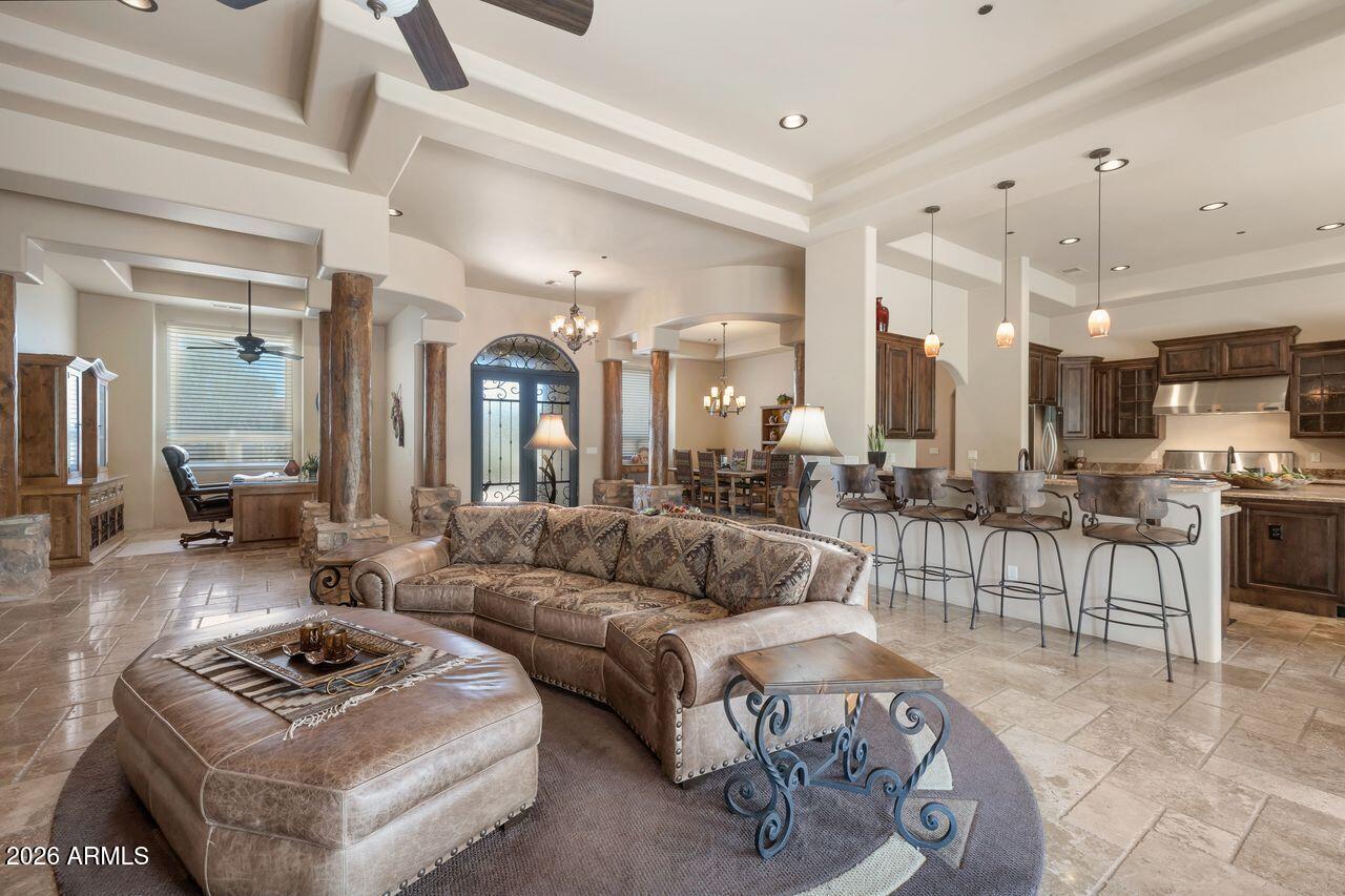 18507 East Picacho Road Rio Verde, AZ 85263 - Photo 12 of 33 a living room with furniture and a view of kitchen
