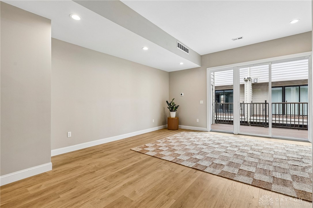 3906 Edwards Road, Unit C Cincinnati, OH 45209 - Photo 21 of 46 This bright living area features sleek flooring and convenient sliding doors leading to a private balcony.
