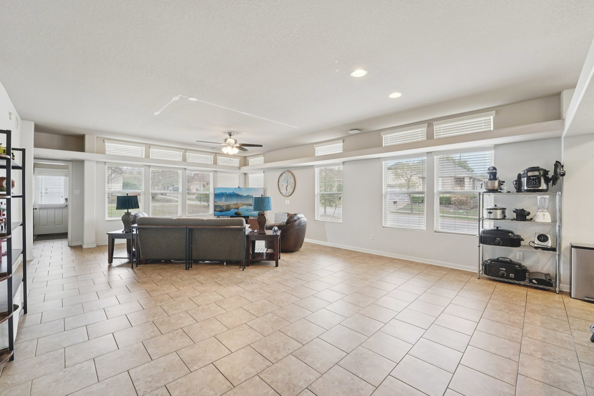 1048 Sanders Kyle, TX 78640 - Photo 3 of 18 a living room with furniture and a flat screen tv