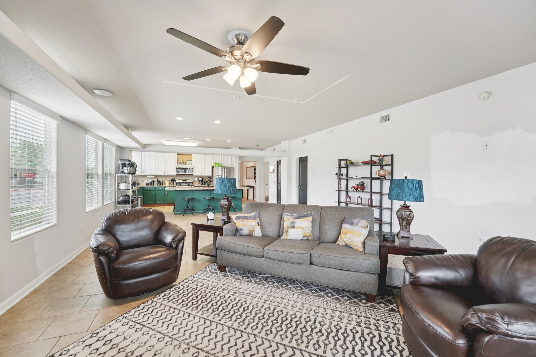 1048 Sanders Kyle, TX 78640 - Photo 5 of 18 a living room with furniture and a ceiling fan