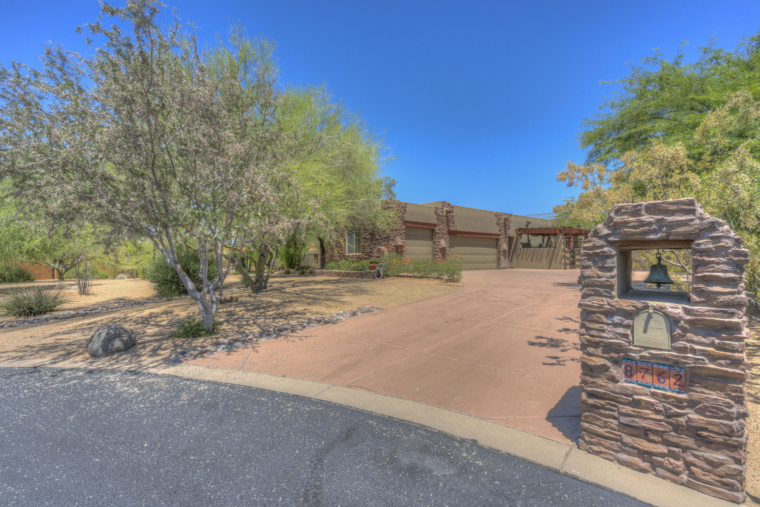 8762 East Arroyo Seco Road Scottsdale, AZ 85266 - Photo 1 of 1 a view of street with with trees