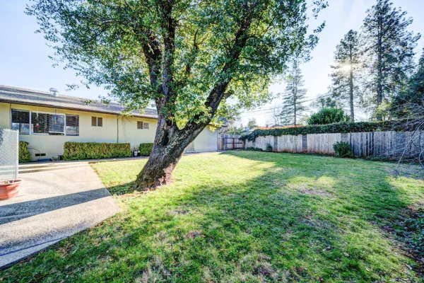 a view of a house with a back yard