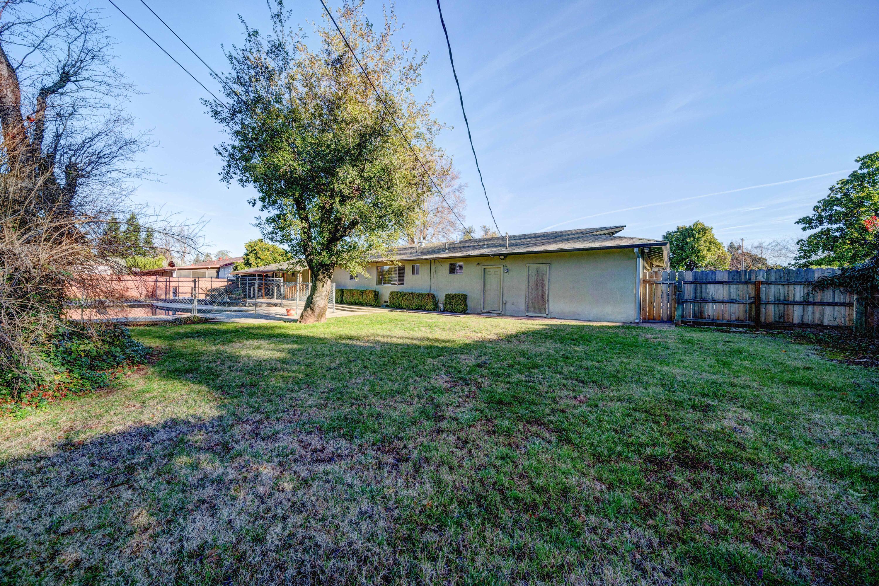 920 Hallmark Drive Redding, CA 96001 - Photo 29 of 34 a front view of house with yard and green space