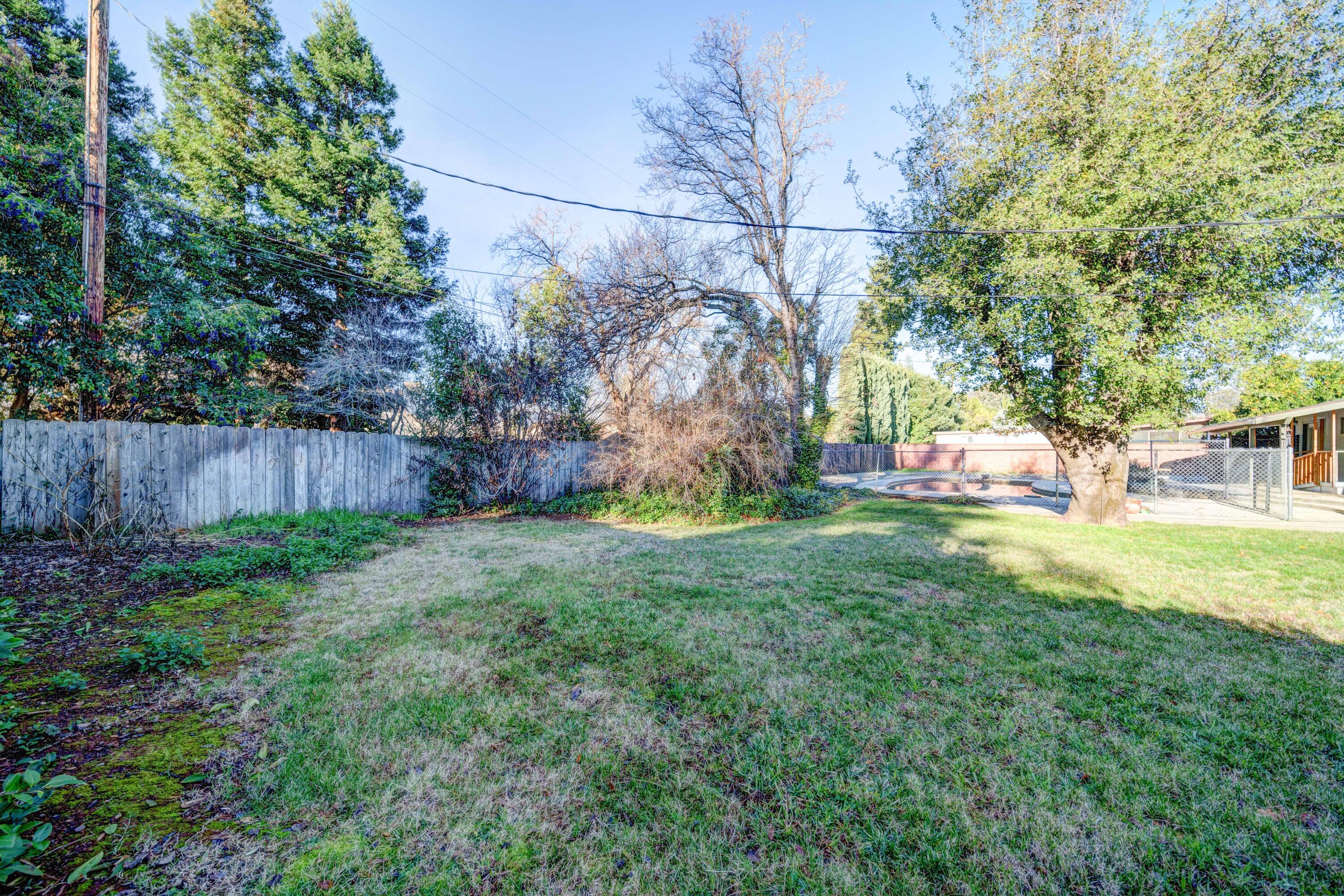 920 Hallmark Drive Redding, CA 96001 - Photo 30 of 34 a view of yard with tree