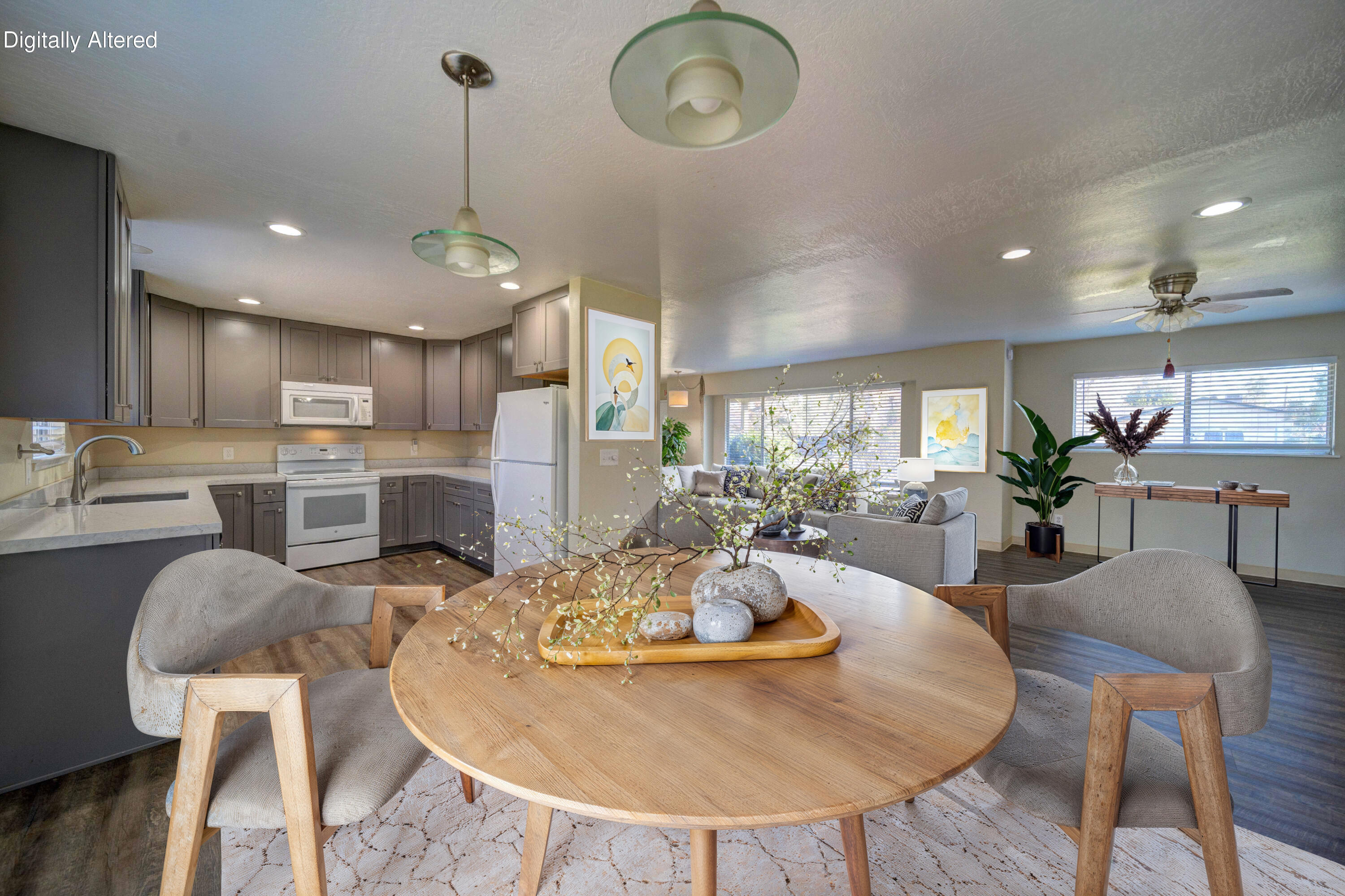 920 Hallmark Drive Redding, CA 96001 - Photo 7 of 34 an open kitchen with dining table and chairs
