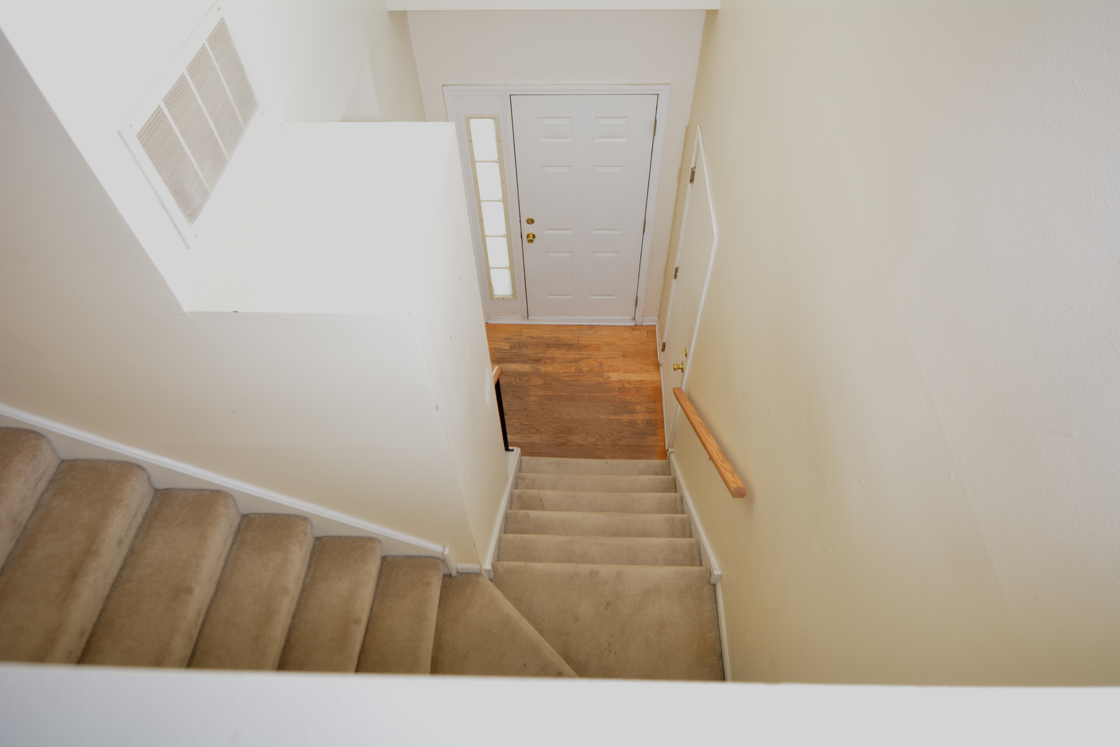 8249 Ripple Ridge Darien, IL 60561 - Photo 14 of 27 a view of a hallway with staircase