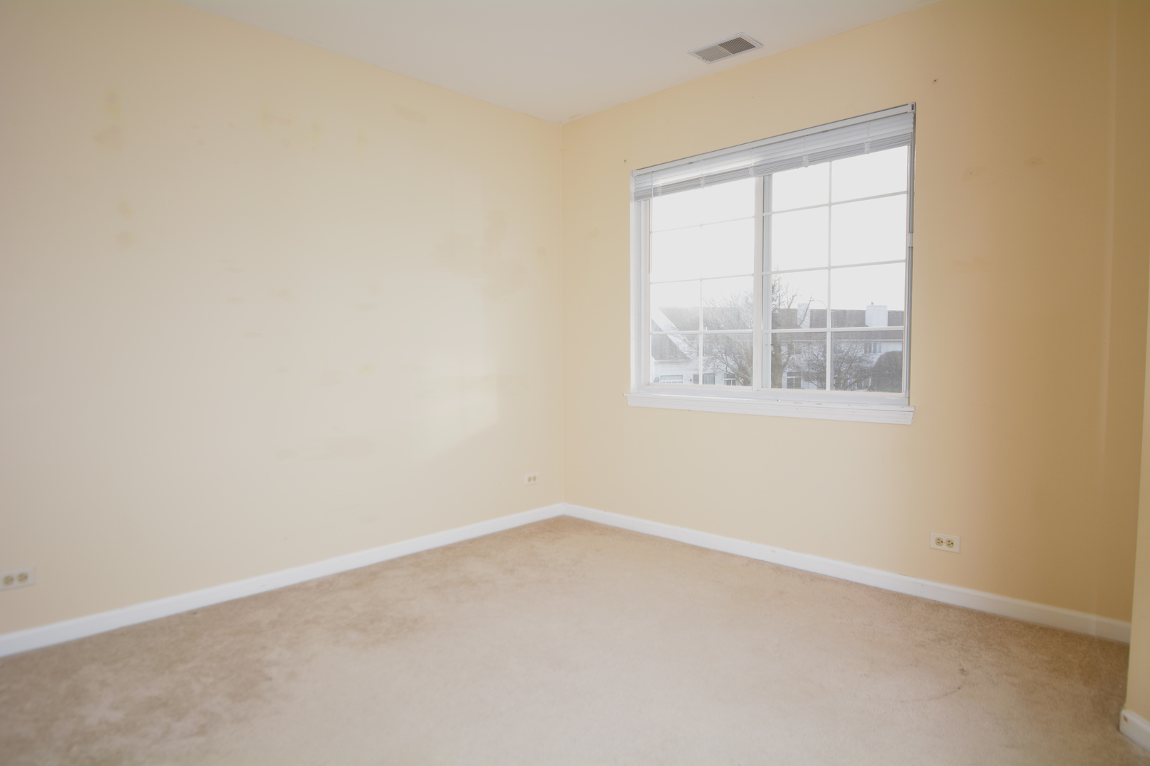 8249 Ripple Ridge Darien, IL 60561 - Photo 16 of 27 an empty room with a window