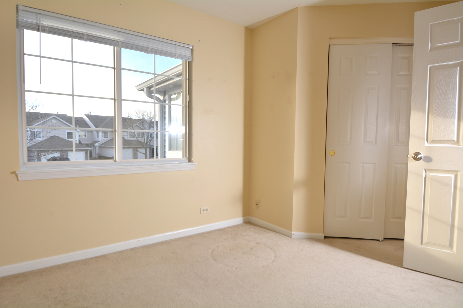 8249 Ripple Ridge Darien, IL 60561 - Photo 17 of 27 an empty room with a window