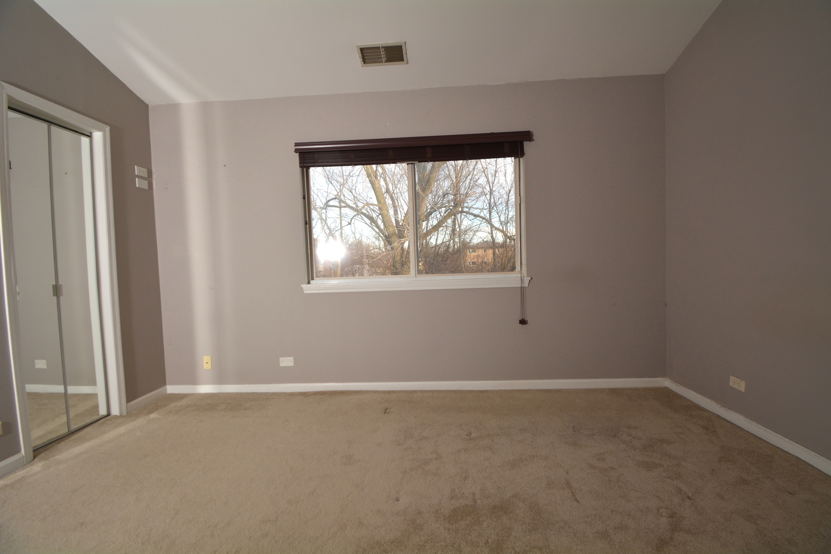 8249 Ripple Ridge Darien, IL 60561 - Photo 20 of 27 an empty room with windows