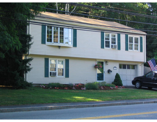 321 Paradise Road Swampscott, MA 01907 - Photo 1 of 1 a front view of a house with a yard