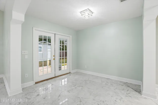 an empty room with windows