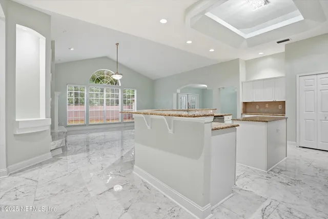 a view of kitchen with windows